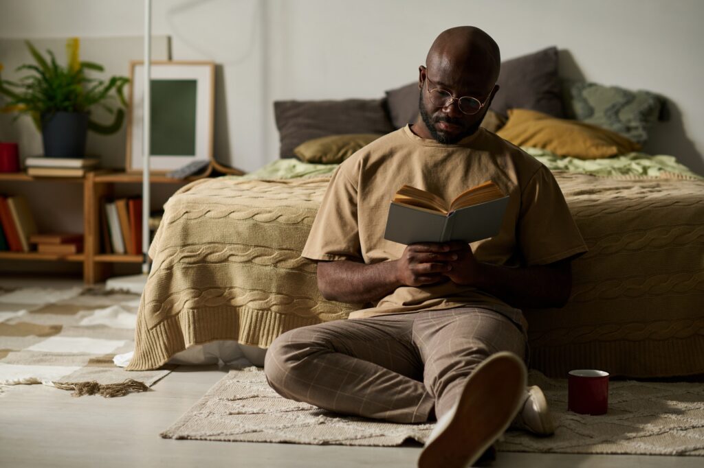 Man reading book in his free time