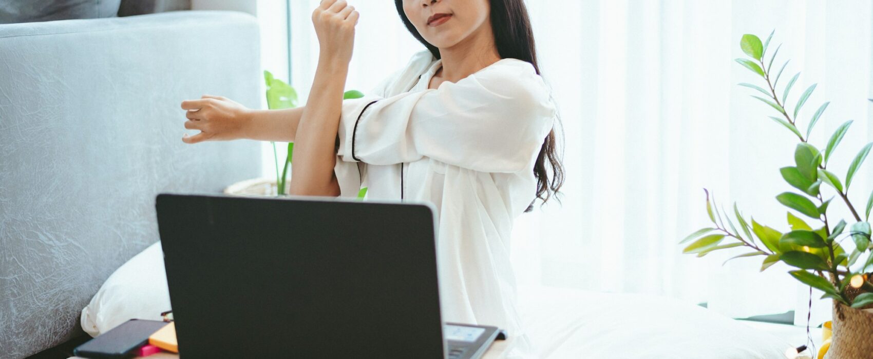 young Asian woman freelance working business work on laptop at home, working from home concept