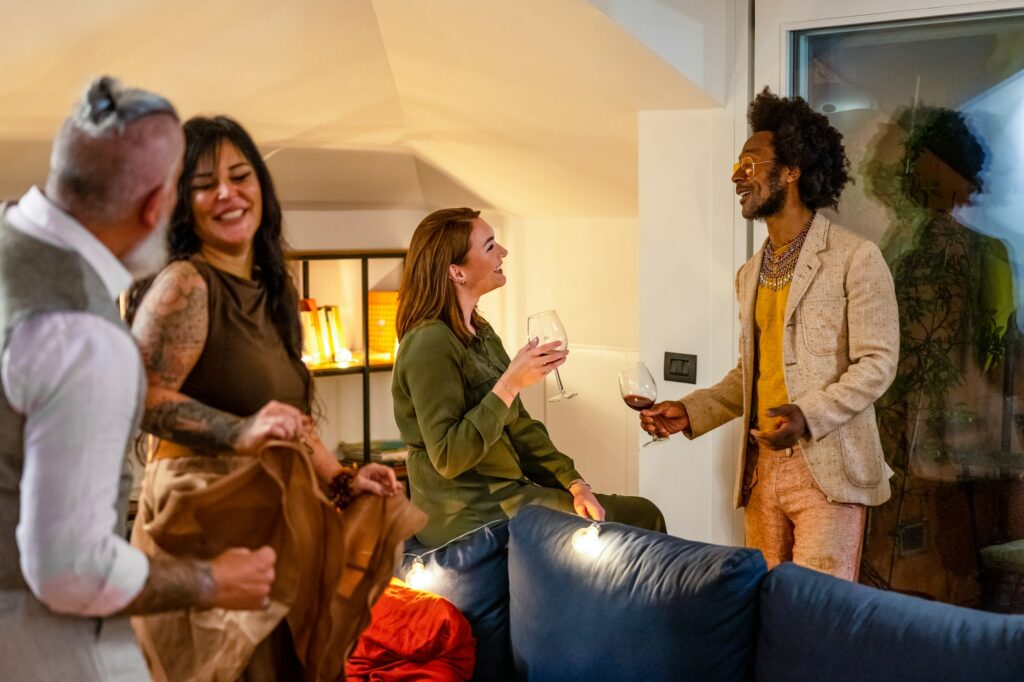 Diverse group of friends having fun, dancing and socializing