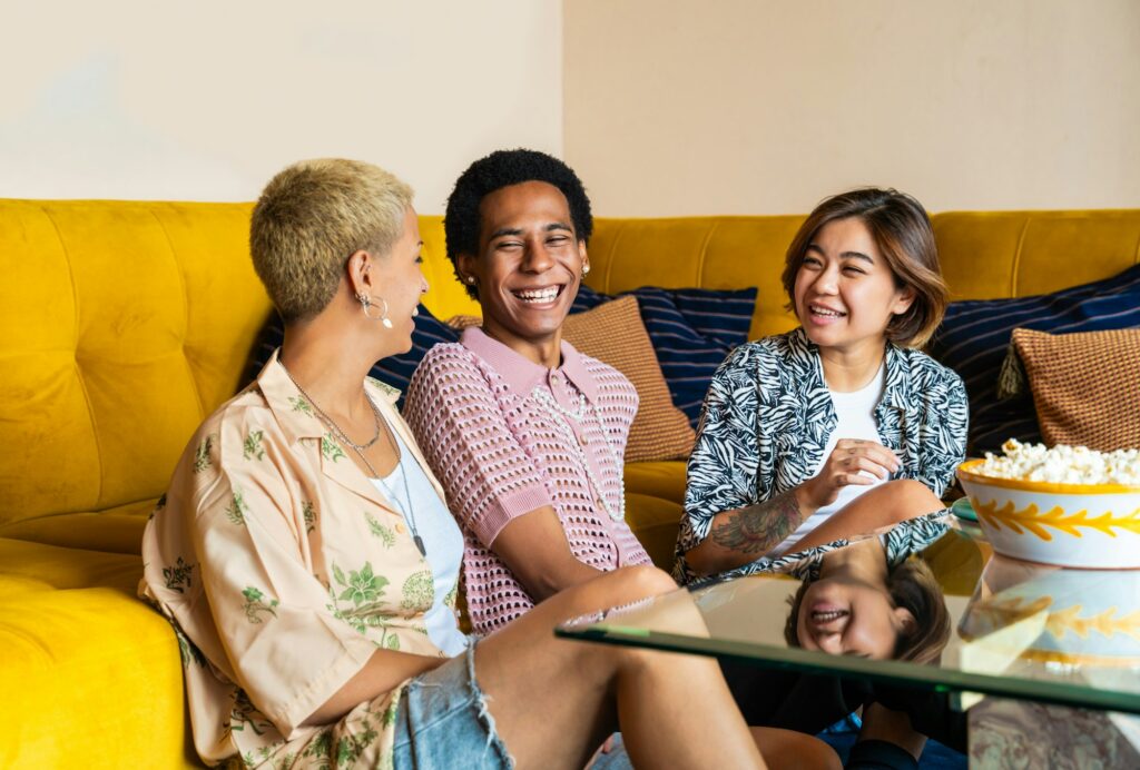 Group of friends bonding at home, LGBTQ and diversity concepts