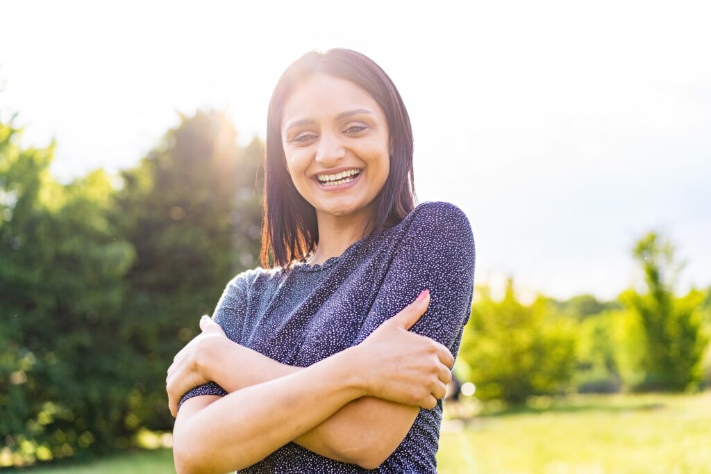 Radiant Indian Woman: Embracing Self in Sunlit Outdoors