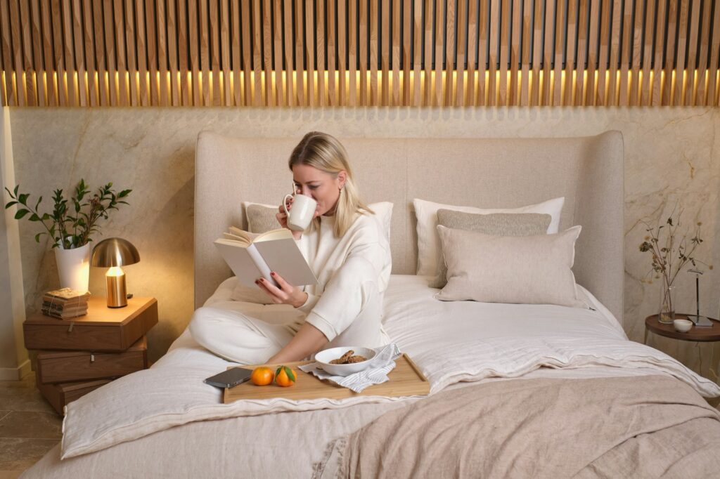 Woman having breakfast in bed