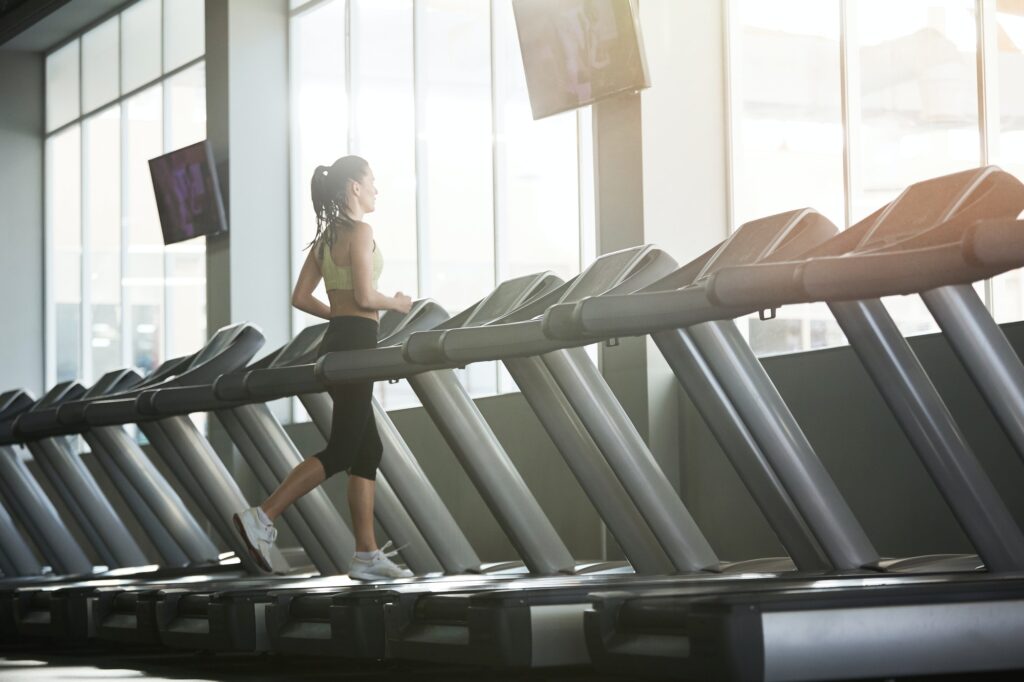 Woman Training Alone in Gym