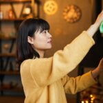 Young Woman Cleaning Home Side View