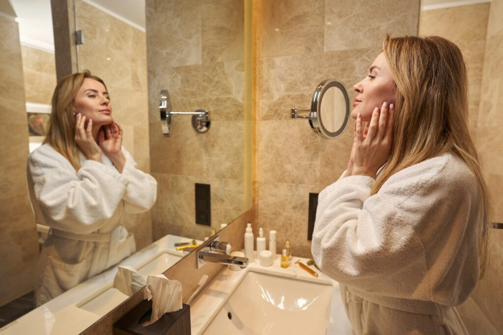 Young lady indulging in self-care during morning at hotel